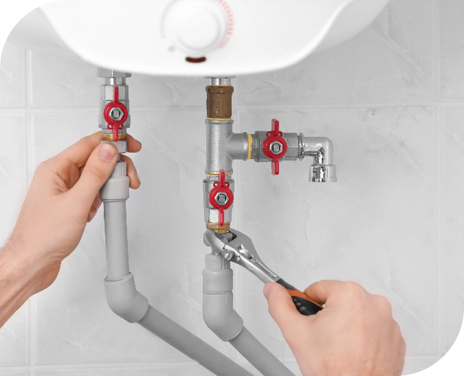 plumber-installing-boiler-bathroom